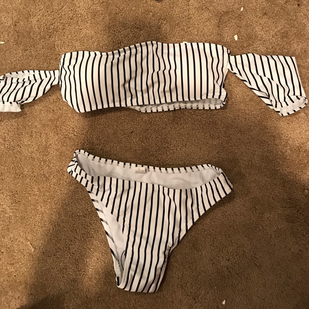 Cool swimsuit. Has a part that goes on the arms