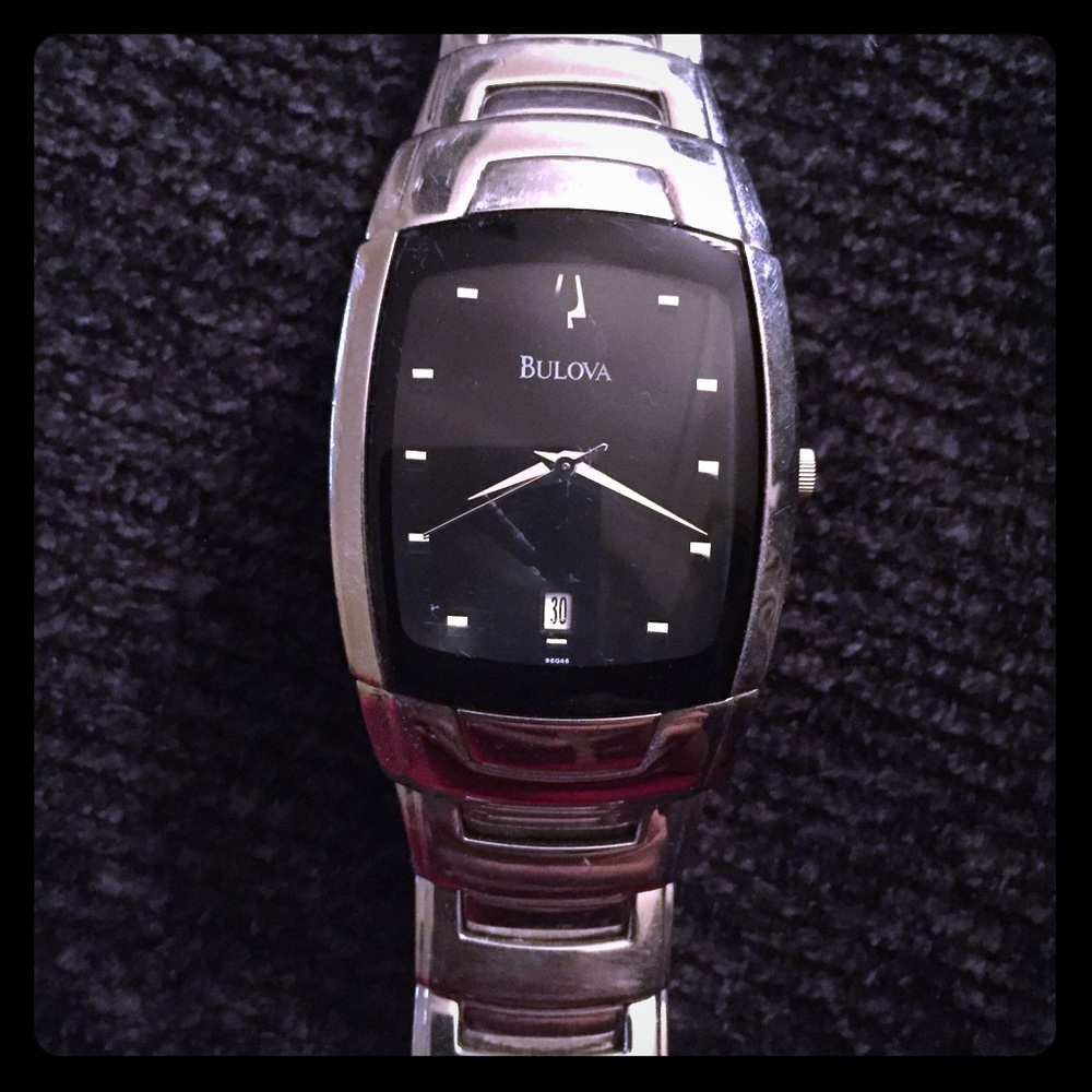 Stainless steel Bulova watch.