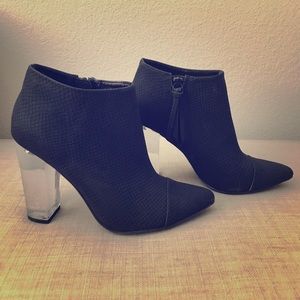 Black booties with clear heel