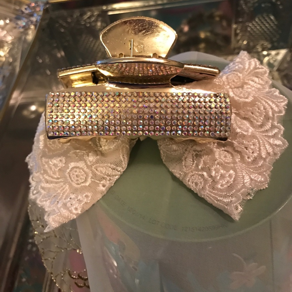 Gold and rhinestone claw clip