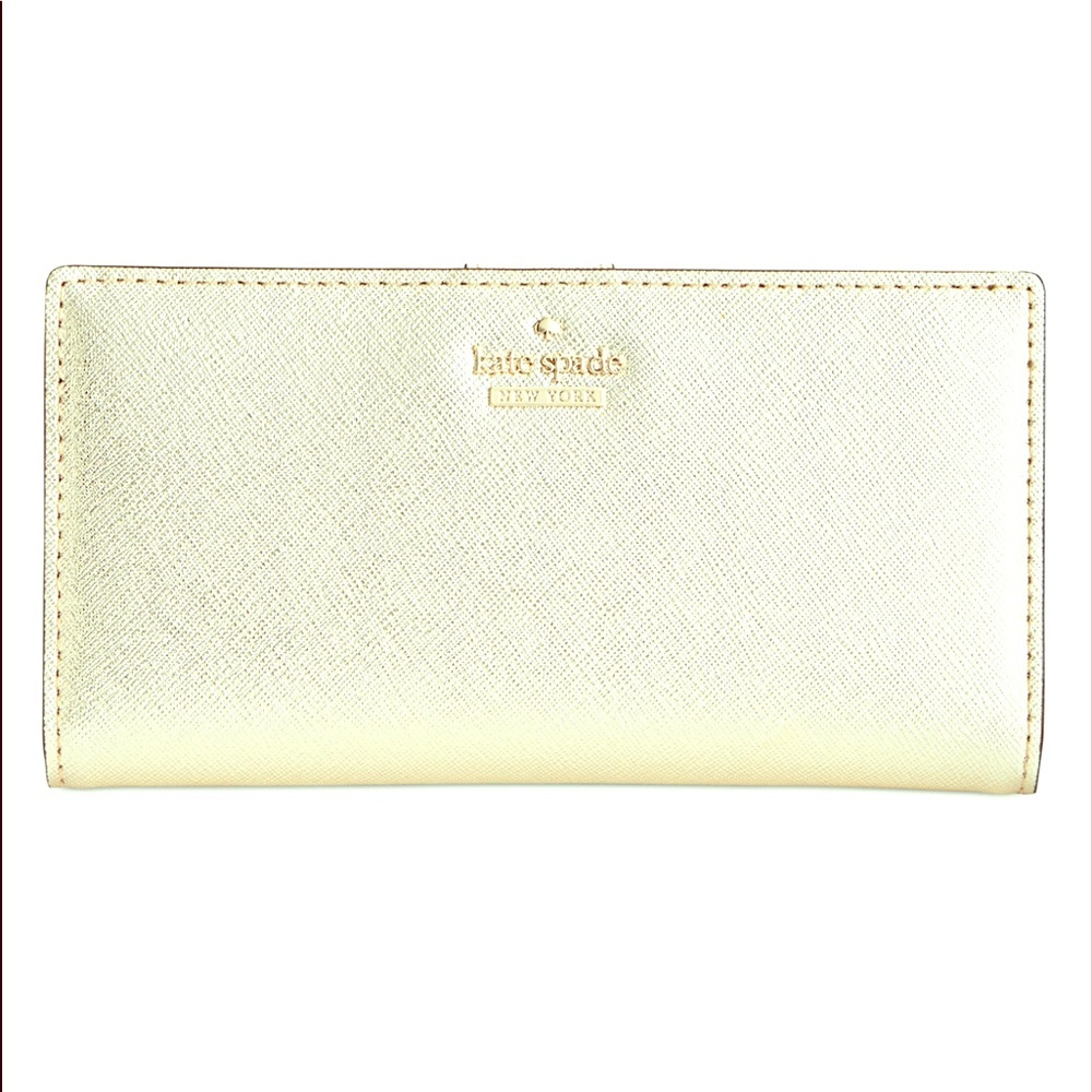 Kate Spade cedar street bi fold gold wallet