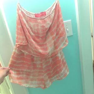 Akira pink and white strapless tie dye romper.