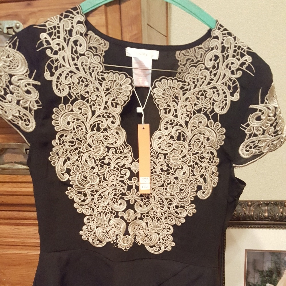 Esley black and gold embroidered peplum dress