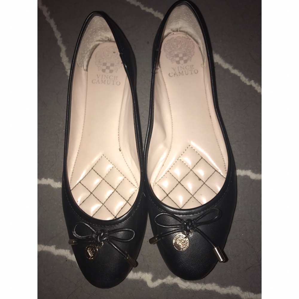 Black leather flats
