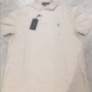 Men's polo shirt size medium. New with tags