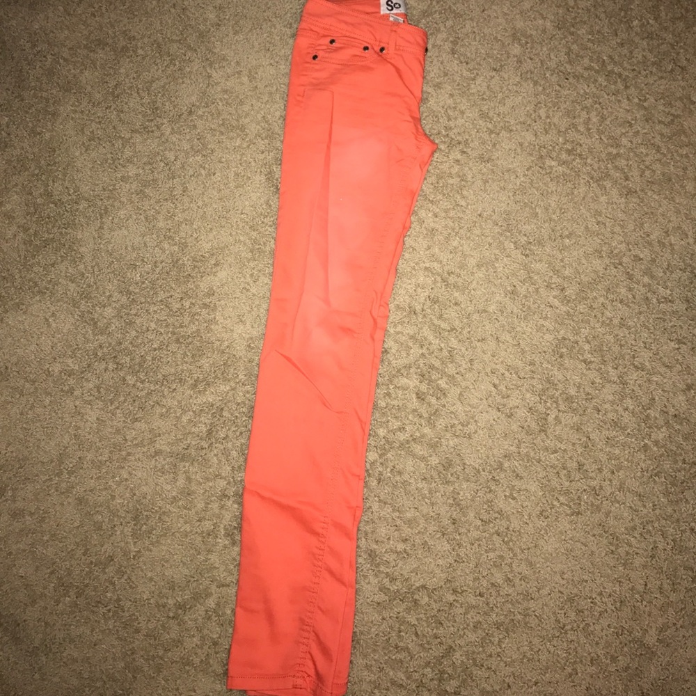 Orange skinny jeans