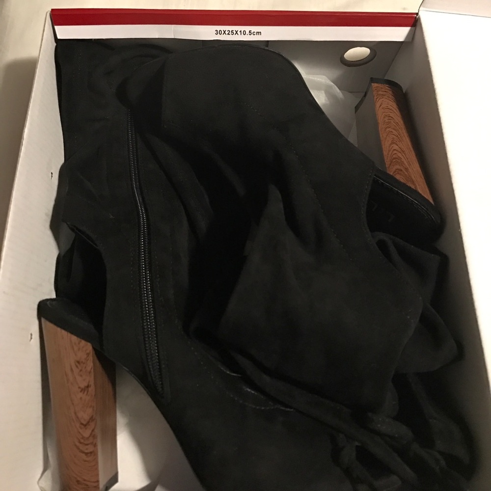 Black suede thigh high boots