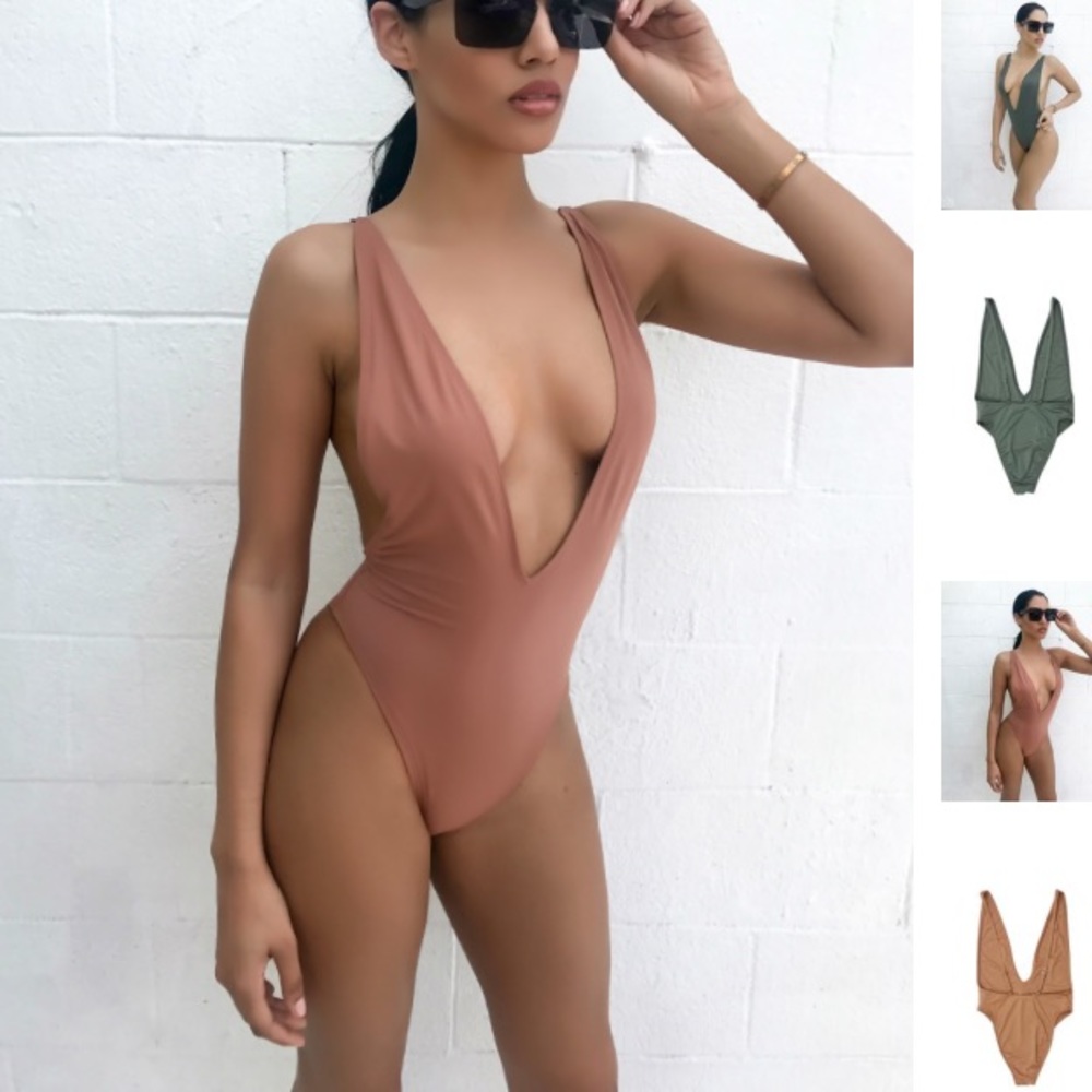Purple one piece bathing suit. BRAND NEW