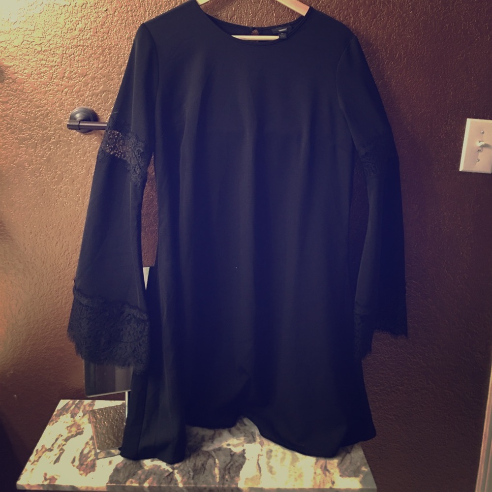 Little black dress with bell sleeves and lace