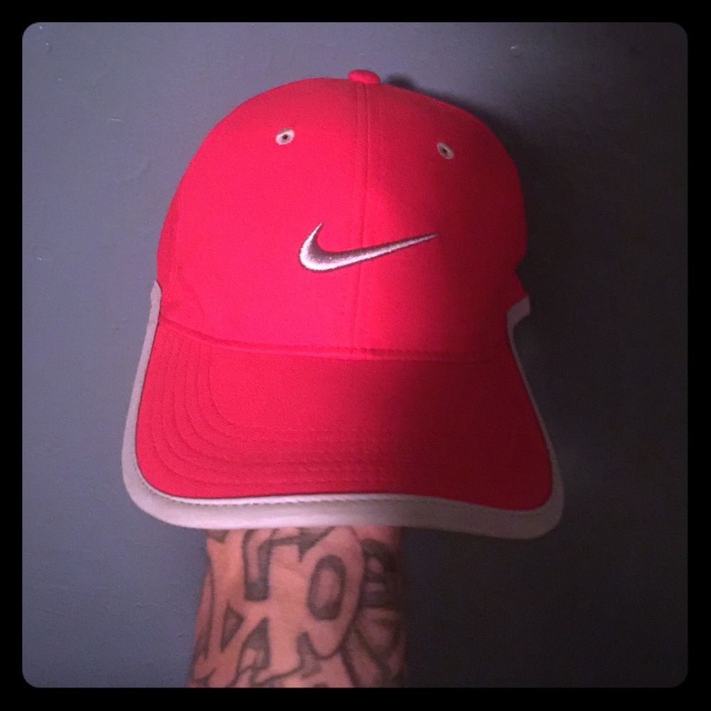 Red Nike hat with gray trim
