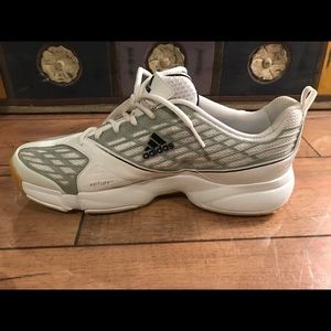 White Adidas athletic shoes