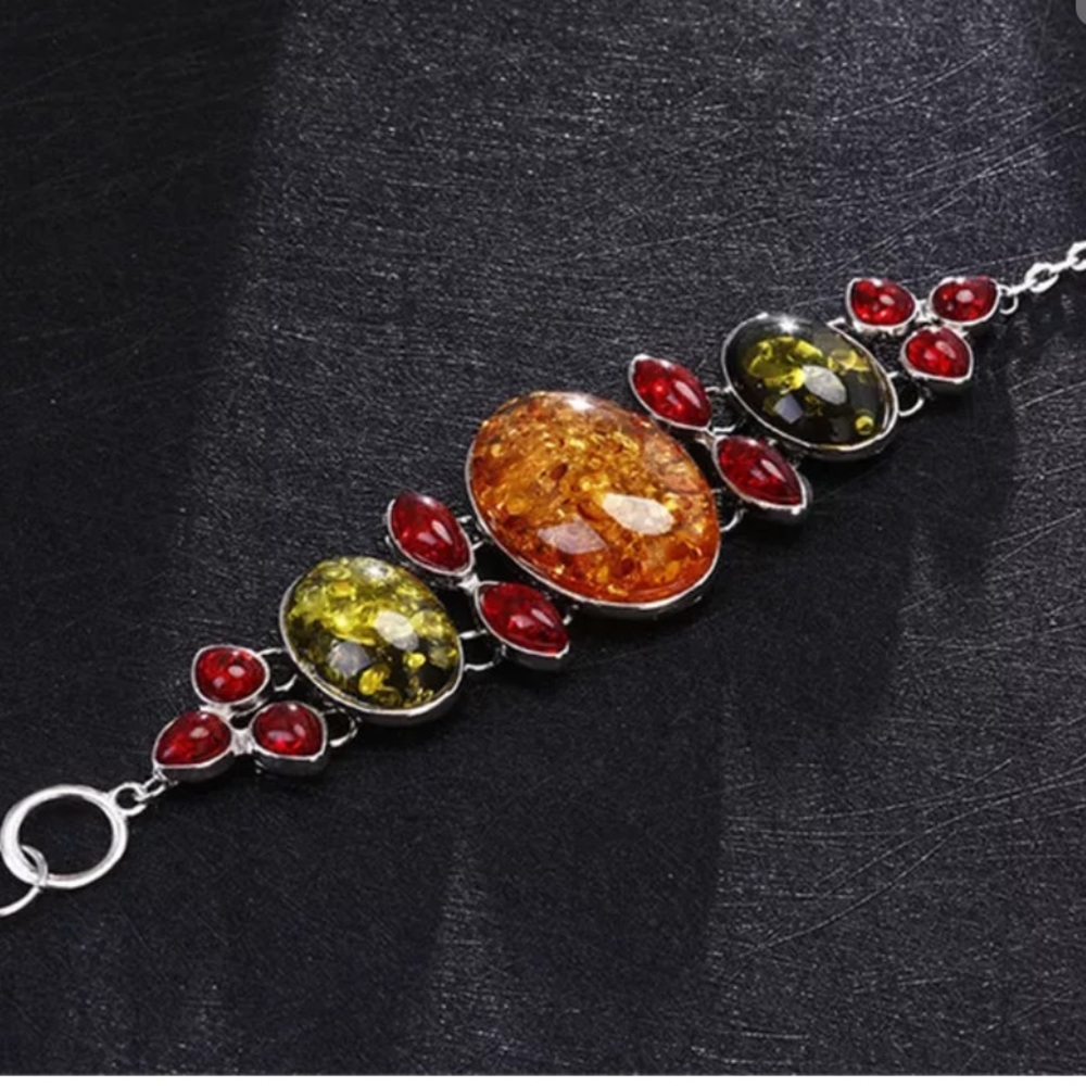 New charm teardrop tri color faux amber bracelet