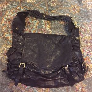 Dark Plum Kooba Handbag with gold hardware