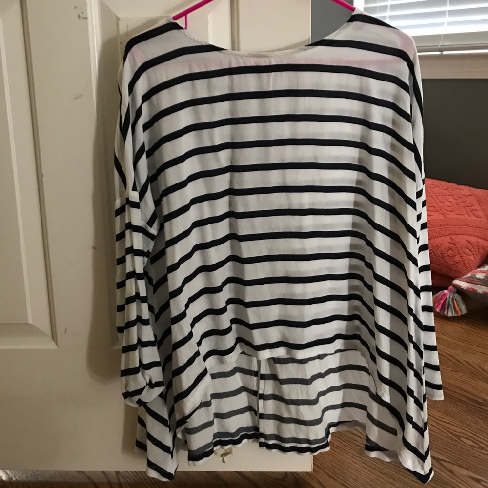 Blue and white striped shirt with small slit