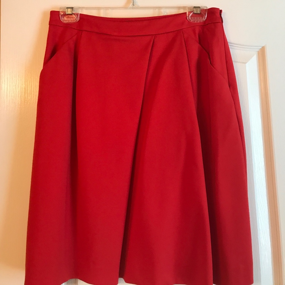 Red pleated skirt
