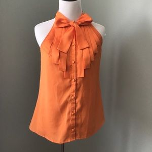 Orange button up top