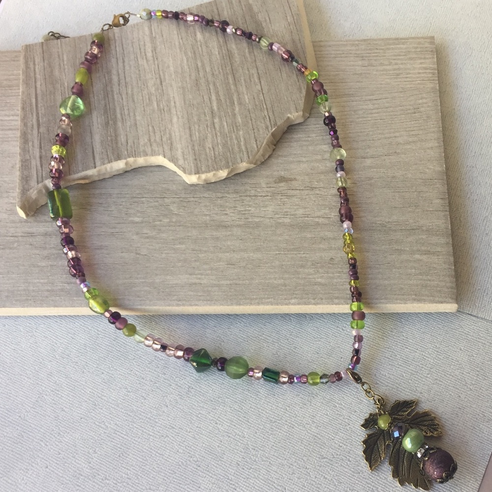 Green and purple bead necklace