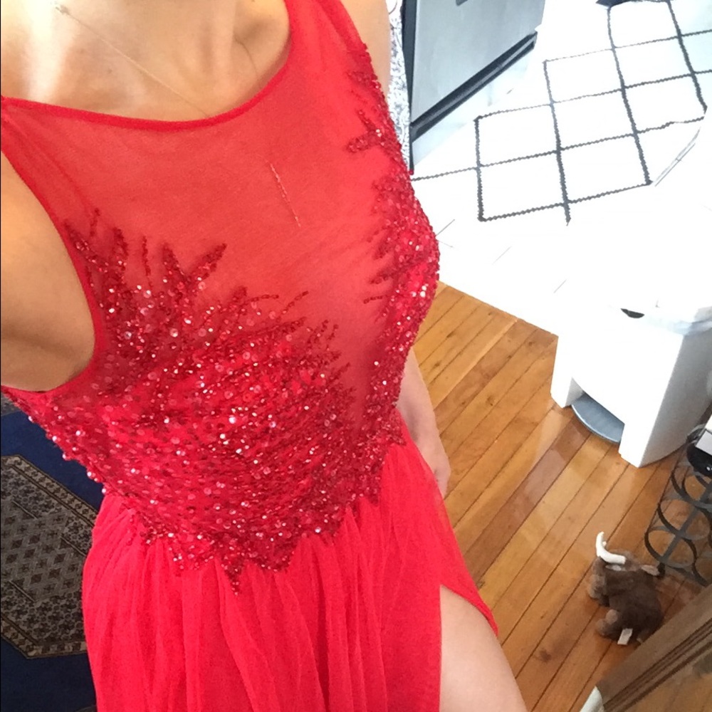 Custom red beaded gown with slit