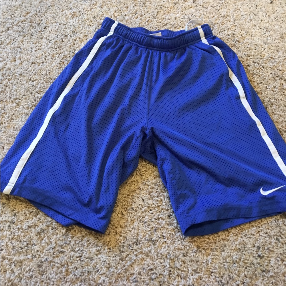 Blue Nike Shorts with white stripes