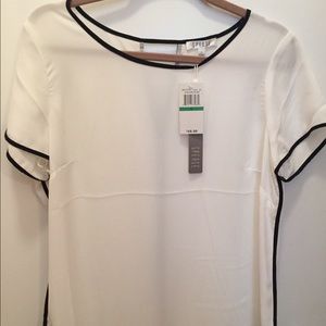 White blouse with black detail