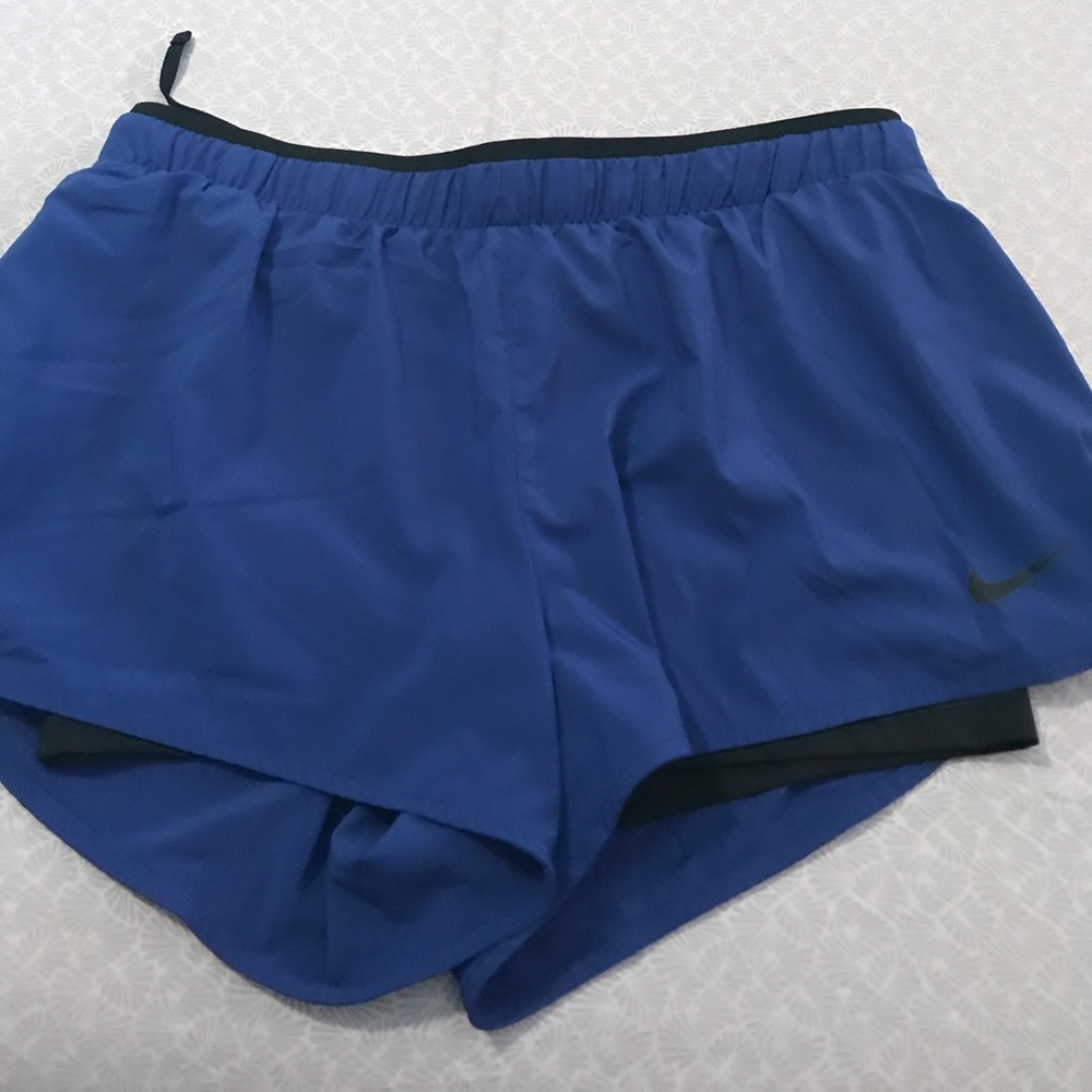 Blue and black Nike Dri Fit shorts