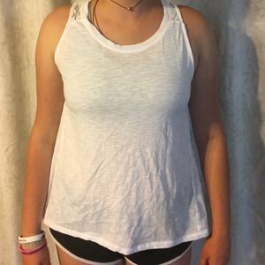 A muscle shirt with embellish lace