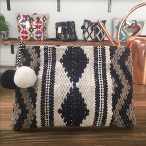 Clutch with POM POM detail