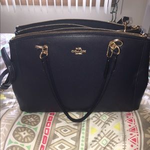Navy blue Coach purse.