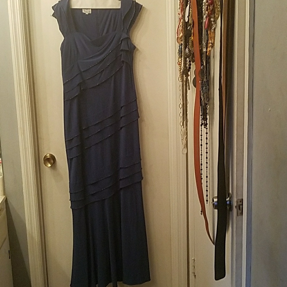 Long semi-formal gown.
