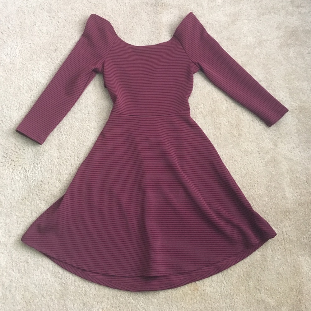 Slimming Maroon dress with black stripes.
