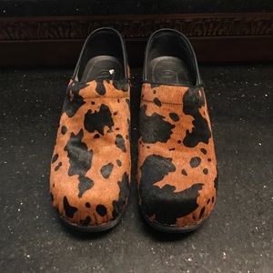 Cow print clogs