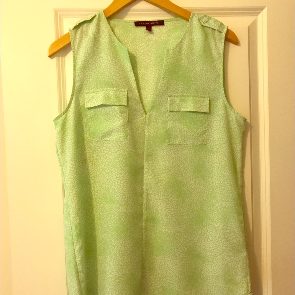 Mint green sleeveless blouse