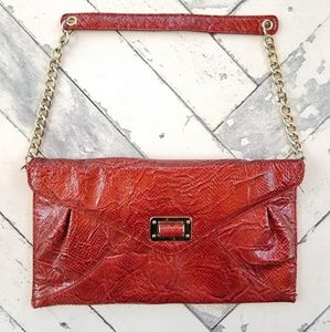 White House Black Market snake print clutch purse