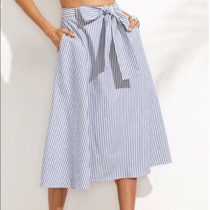 Striped midi skirt Length: 79cm 
Hip:94cm