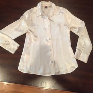 White polyester button- down long sleeve shirt.
