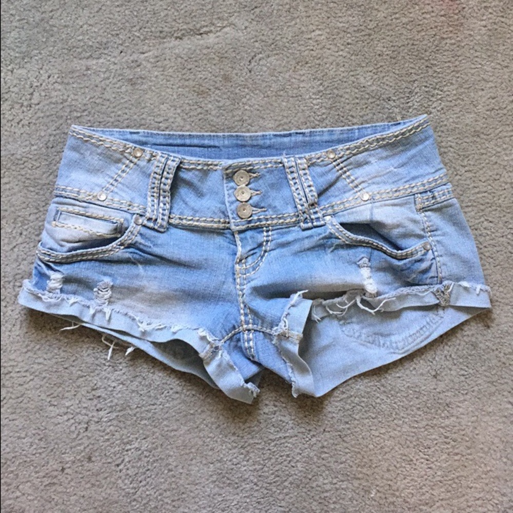 Size 9 women's light blue distressed denim shorts