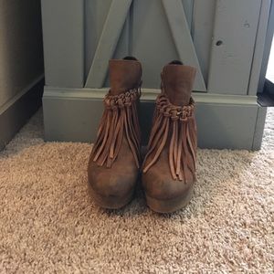Fringed ankle boots