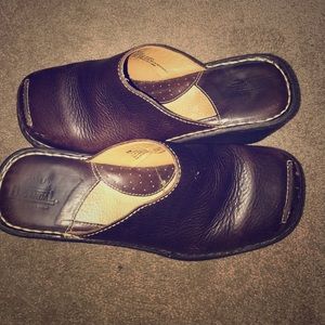 Brown leather clogs