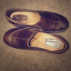 Brown leather clogs