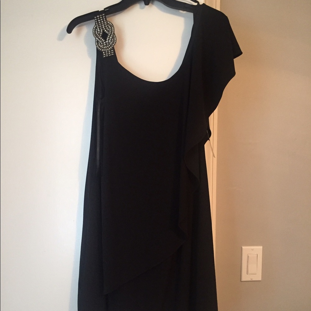 Gorgeous little black dress never worn!