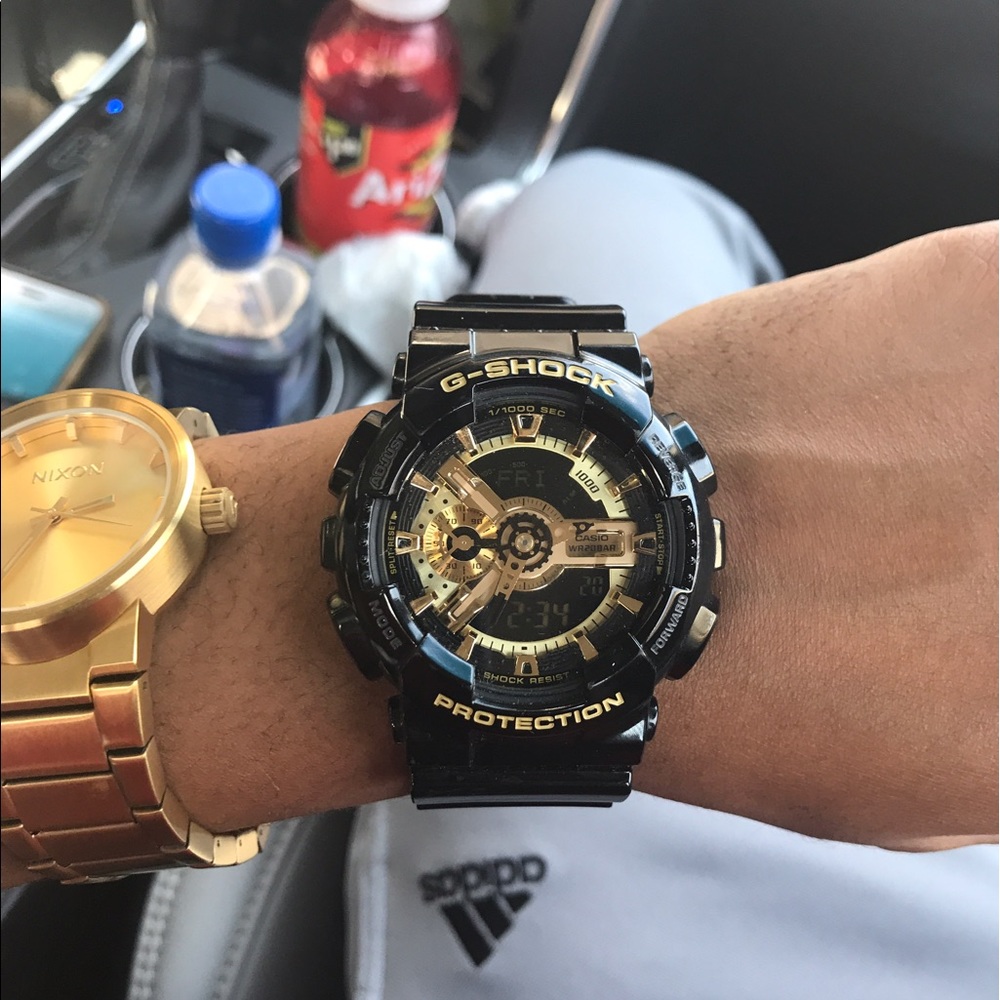 Black and Gold G shock watch