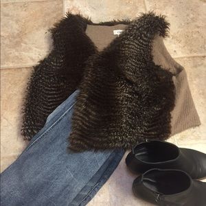 Faux fur vest. Size large. Fluffy and fine.