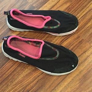 Skechers black slip on water shoes girls 4