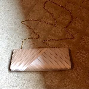 Silk champagne colored clutch