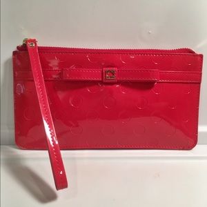 Shiny red kate spade wristlet