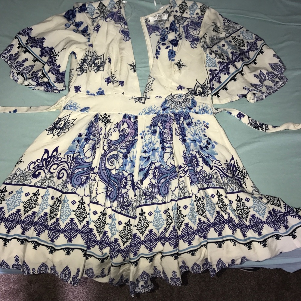 Floral plunging neck line romper