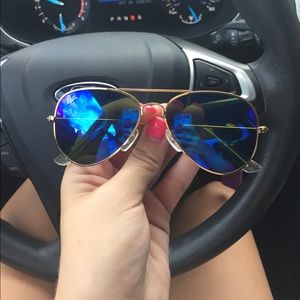 Blue lense ray ban aviator