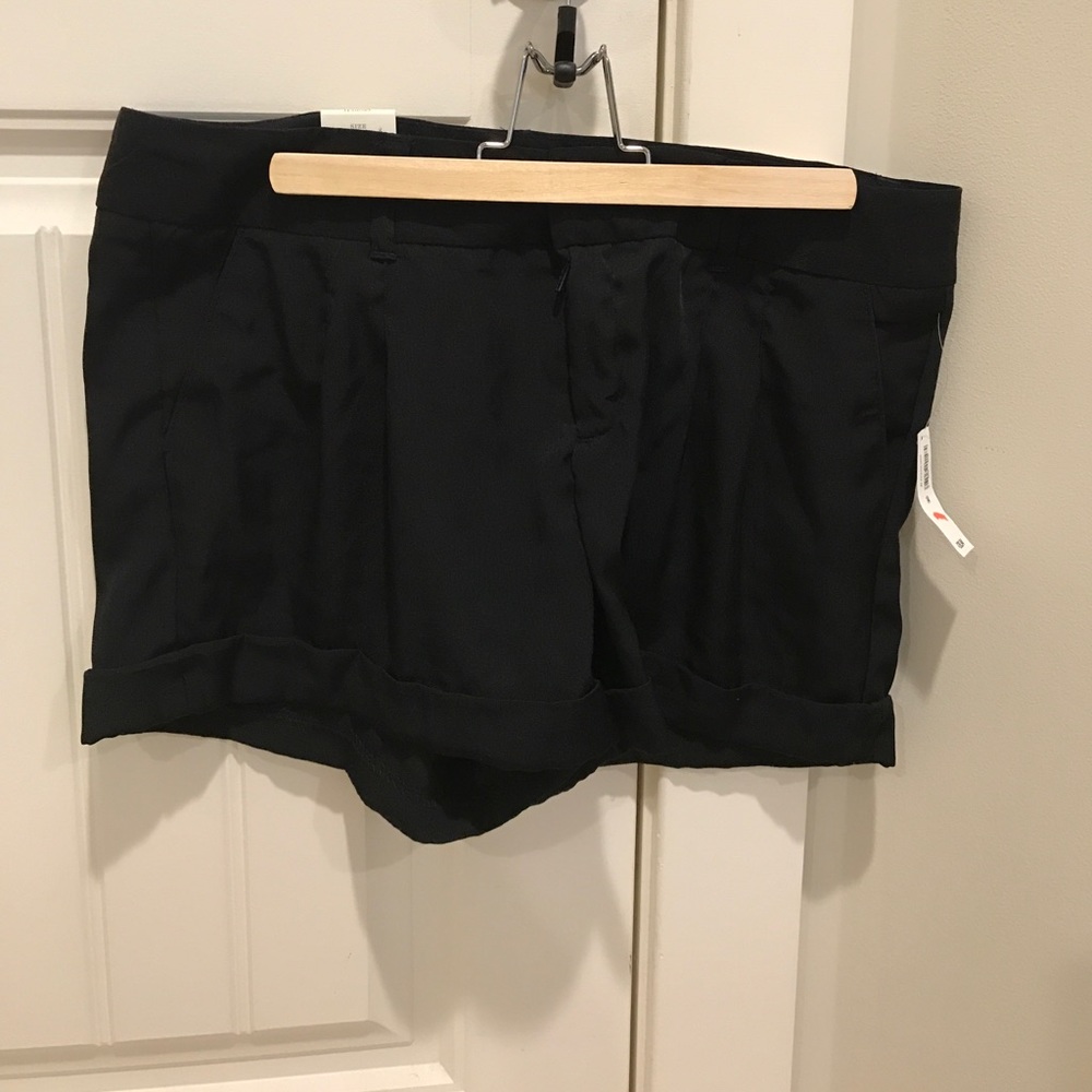 Low rise black shorts.