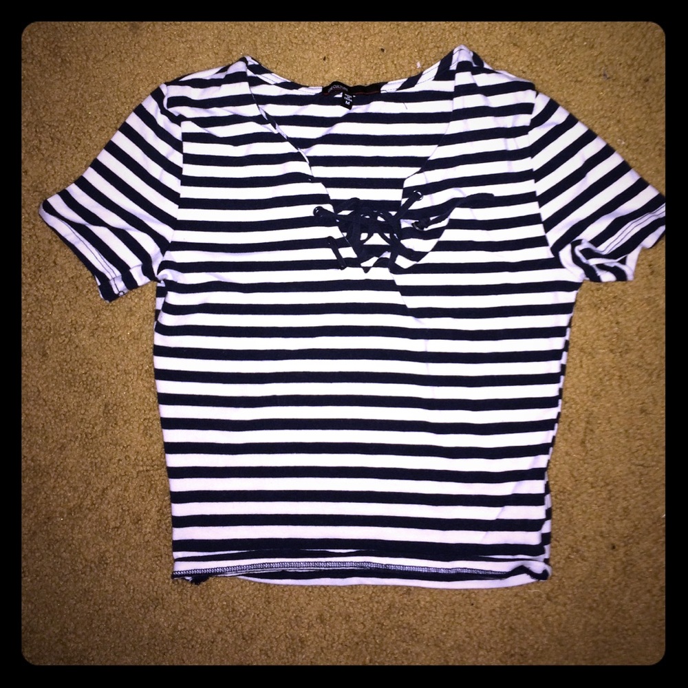 Cute striped crop too with cross string chest.