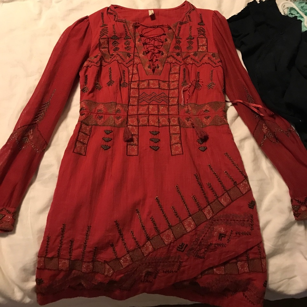 Red free people dress with beads and details